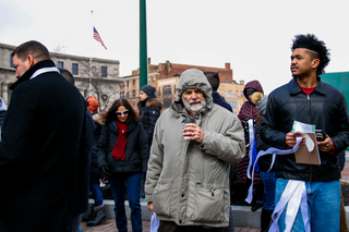 Demonstrators endure the cold weather as they marched with Vera House, which provides shelter, advocacy and counseling services to victims of abuse.